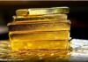 Gold slides to 2-week low as markets embrace riskier assets