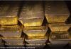 Gold pares back gains as dollar regains ground