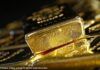 Gold trades at session highs despite dollar recovery