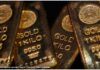 Gold turns negative despite dollar slump