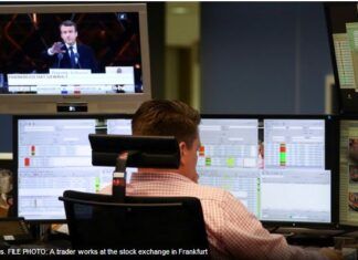 Global stocks, euro dip as Macron win shifts focus to economy