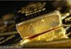 Gold falls toward 3-week low after Congress reaches spending deal