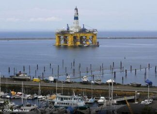 Crude prices fall sharply in Asia ahead of U.S. rig count figures